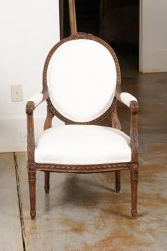 Pair of French 1850s Louis XVI Style Walnut Oval Back Upholstered Armchairs - 3441649