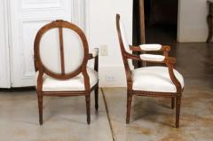 Pair of French 1850s Louis XVI Style Walnut Oval Back Upholstered Armchairs - 3441976