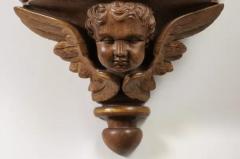Pair of French 1880s Carved Walnut Brackets with Cherubs and Faux Marble Tops - 3432900
