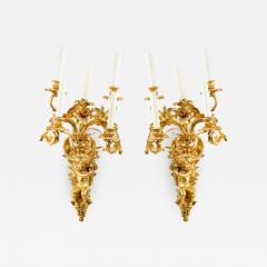 Pair of French Louis XV Style Bronze Dore Cupid Wall Sconces - 1403198