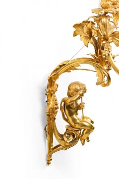 Pair of French Louis XV Style Bronze Dore Cupid Wall Sconces - 4630317