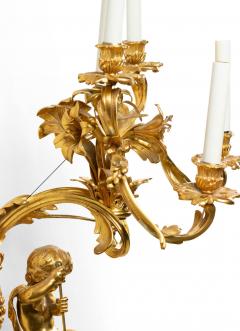 Pair of French Louis XV Style Bronze Dore Cupid Wall Sconces - 4630318