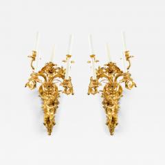 Pair of French Louis XV Style Bronze Dore Cupid Wall Sconces - 4645296