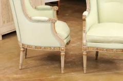 Pair of French Louis XVI Style 1900s Painted and Parcel Gilt Berg res Chairs - 3521513