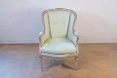 Pair of French Louis XVI Style 1900s Painted and Parcel Gilt Berg res Chairs - 3722425