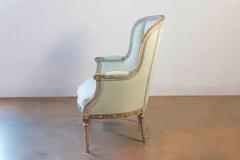 Pair of French Louis XVI Style 1900s Painted and Parcel Gilt Berg res Chairs - 3722435