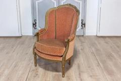 Pair of French Louis XVI Style Gilded Wood Berg res Chairs with Carved D cor - 3729959