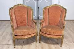 Pair of French Louis XVI Style Gilded Wood Berg res Chairs with Carved D cor - 3729960