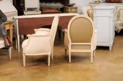 Pair of French Louis XVI Style Painted Berg res Chairs with Oval Shaped Backs - 3538356