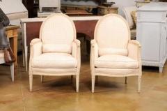 Pair of French Louis XVI Style Painted Berg res Chairs with Oval Shaped Backs - 3538405