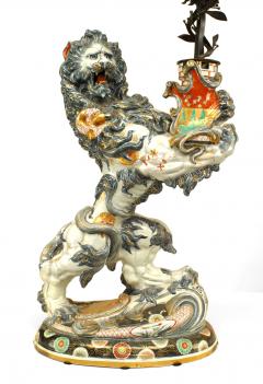 Pair of French Porcelain Lions Holding Wrought Iron Candelabras - 4625925