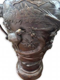 Pair of Japanese tall bronze floor vases with handles and bird relief - 4634239