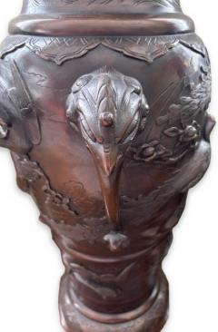 Pair of Japanese tall bronze floor vases with handles and bird relief - 4634243