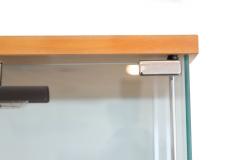 Pair of Mid Century Modern Glass And Blond Wood Display Cases - 4800423