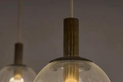 Pair of Monumental Mid Century Chandeliers in Glass Metal and Patinated Brass - 4582271