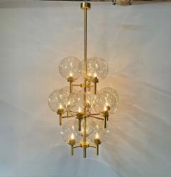 Pair of Monumental Mid Century Modern Style Chandeliers in Amber Glass and Brass - 3247148