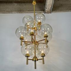 Pair of Monumental Mid Century Modern Style Chandeliers in Amber Glass and Brass - 3247149