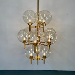 Pair of Monumental Mid Century Modern Style Chandeliers in Amber Glass and Brass - 3247150