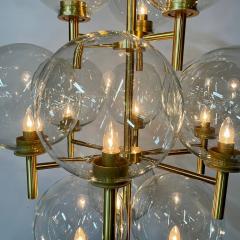Pair of Monumental Mid Century Modern Style Chandeliers in Amber Glass and Brass - 3247153