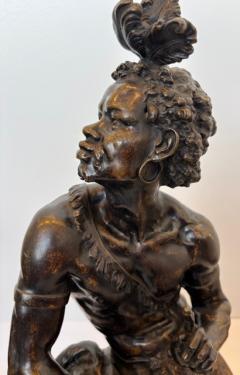 Pair of Moreau French Victorian bronze seated nubian figures with feathers in ha - 4628516