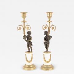 Pair of Regency Bronze & Marble Classical Putti Candlesticks Pair of Regency Bronze & Marble Classical Putti Candlesticks