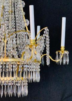 Pair of Russian Neoclassical Style Bronze and Crystal 7 Light Chandeliers - 1249081