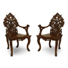 Pair of Rustic Black Forest Carved Walnut Armchairs - 4628000