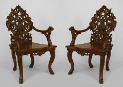 Pair of Rustic Black Forest Carved Walnut Open Arm Chairs - 549628