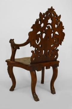 Pair of Rustic Black Forest Carved Walnut Open Arm Chairs - 549632