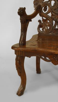 Pair of Rustic Black Forest Carved Walnut Open Arm Chairs - 549636