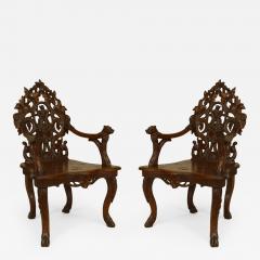 Pair of Rustic Black Forest Carved Walnut Open Arm Chairs - 551046