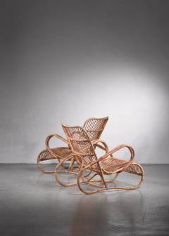 Pair of Scandinavian Modern rattan lounge chairs - 2745601