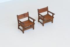 Pair of Spanish brutalist lounge chairs oak and saddle leather Spain 1960 - 3990739