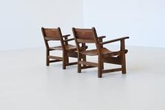 Pair of Spanish brutalist lounge chairs oak and saddle leather Spain 1960 - 3990742