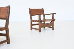 Pair of Spanish brutalist lounge chairs oak and saddle leather Spain 1960 - 3990747