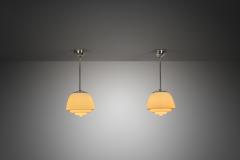 Pair of Stepped Opal Glass Pendant Lamps with Metal Frame Europe 1940s - 4267046