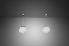 Pair of Stepped Opal Glass Pendant Lamps with Metal Frame Europe 1940s - 4267049