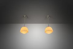 Pair of Stepped Opal Glass Pendant Lamps with Metal Frame Europe 1940s - 4267051