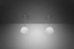 Pair of Stepped Opal Glass Pendant Lamps with Metal Frame Europe 1940s - 4267053