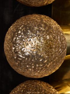 Pair of Vertical Brass and Smoked Textured Glass Globe Wall Sconces - 4693240