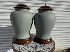 Pair of Wood and Heavy Plastic Urns - 4375826