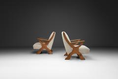Pair of Wood and Sheepskin Lounge Chairs Europe Mid 20th Century - 4350692