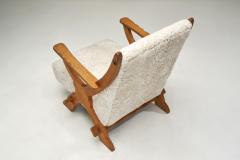 Pair of Wood and Sheepskin Lounge Chairs Europe Mid 20th Century - 4350693
