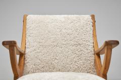 Pair of Wood and Sheepskin Lounge Chairs Europe Mid 20th Century - 4350695