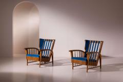 Pair of cherrywood lounge chairs Italy 1950s - 4396469