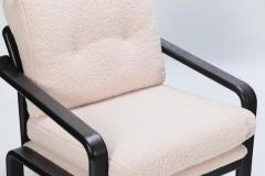 Pair of ebonized French open armchairs recently upholstered in Boucle fabric  - 3242921