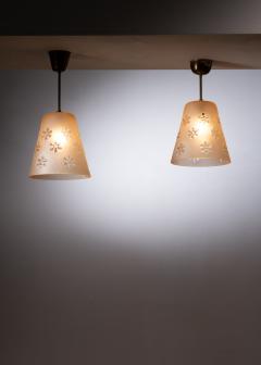 Pair of frosted glass pendant with flower motifs - 2711240