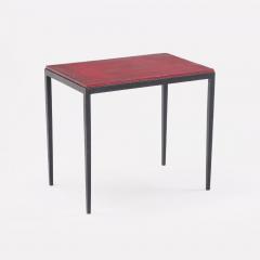 Pair of iron and deep red leather end tables in the manner of Jean Michel Frank  - 3702531