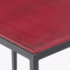 Pair of iron and deep red leather end tables in the manner of Jean Michel Frank  - 3702534