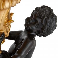 Pair of large Louis XVI style gilt and patinated bronze cherub candelabra - 3204543